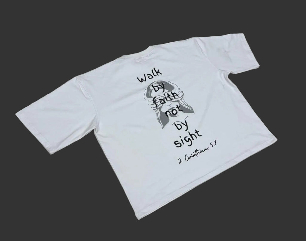 White t-shirt explaining 2 Corinthians 5:7 